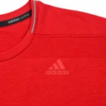 Red Adidas Running Shirt Close-Up.png